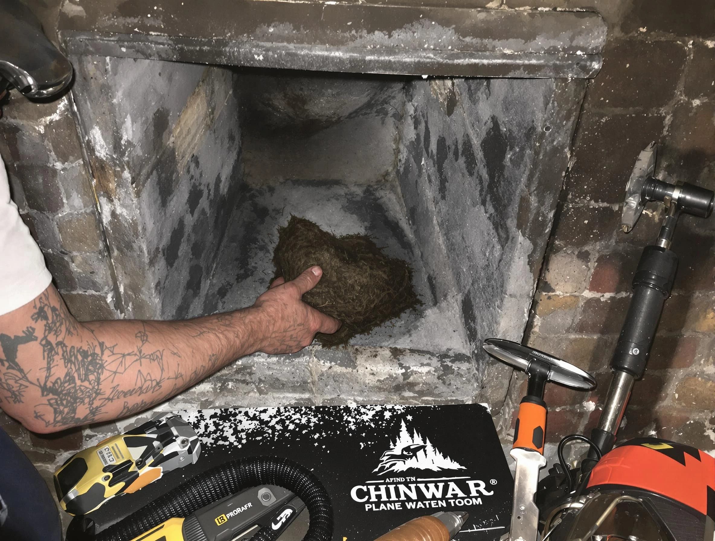 Franklin Park Chimney Sweep safely removing debris and screening chimney in Franklin Park, PA